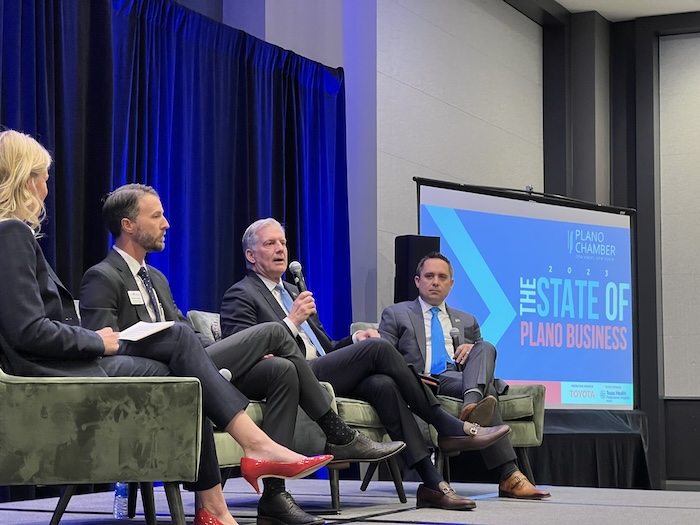 People on stage during Plano Chamber of Commerce Signature Events