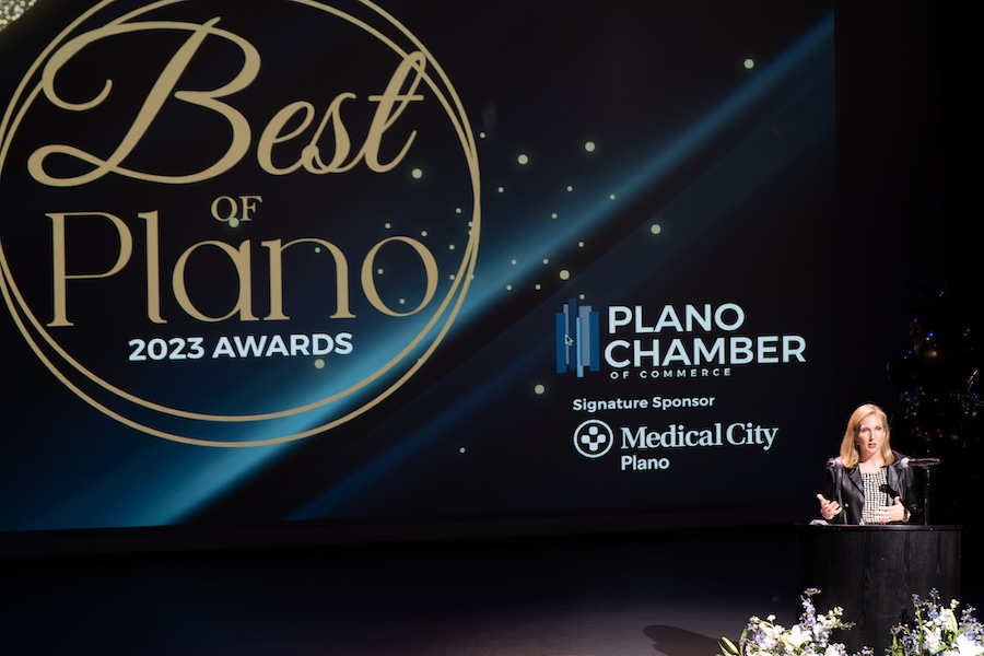 Lady presenting 2023 Award at Plano Chamber of Commerce
